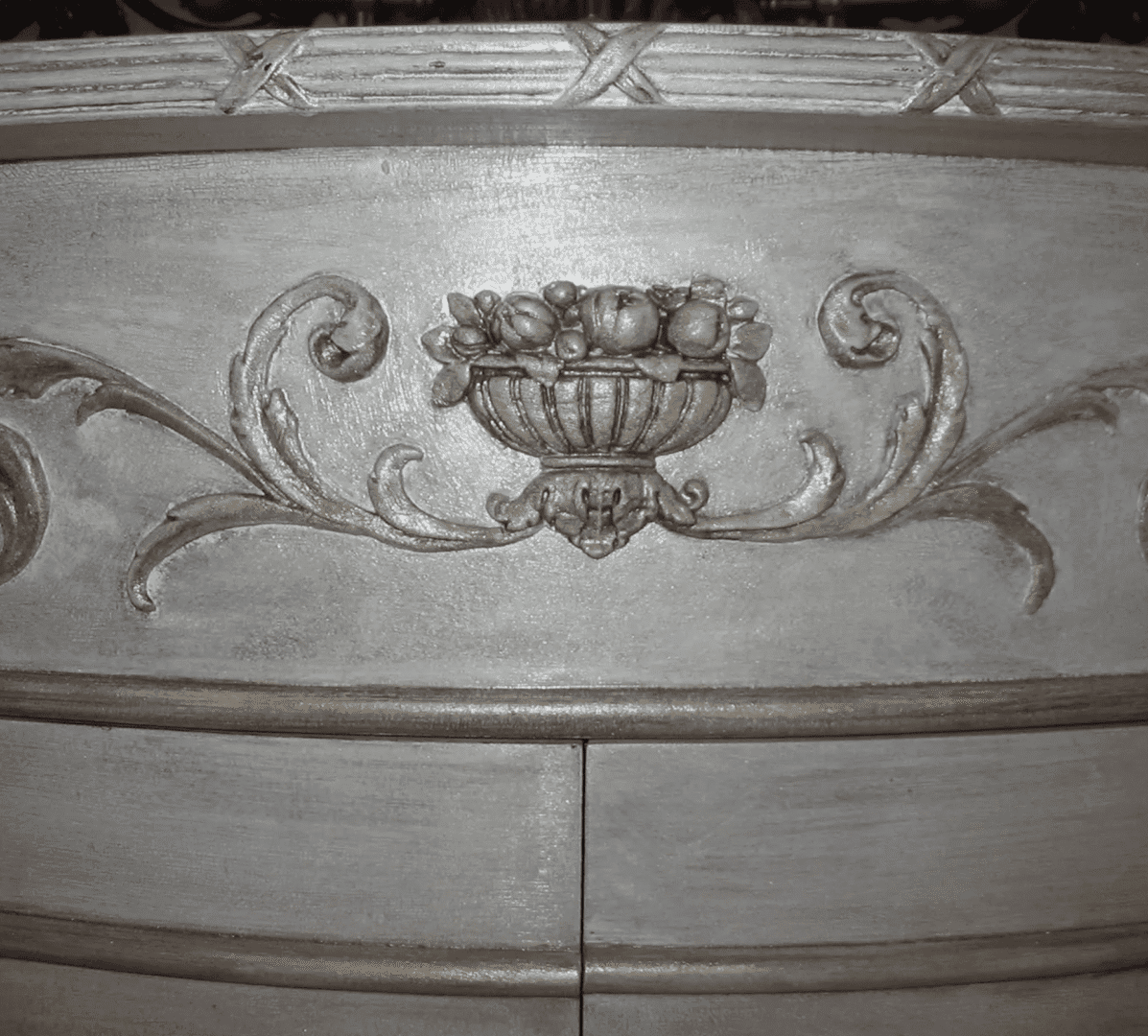 Ornate carved wooden detail on furniture